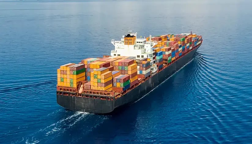 Container ship traveling across the ocean